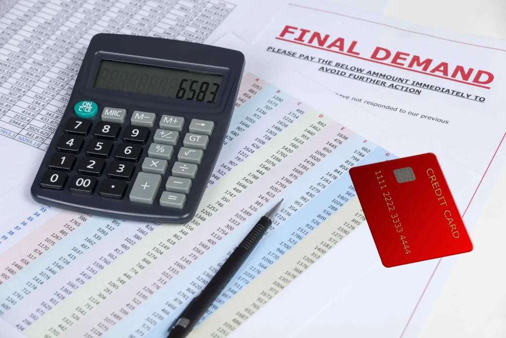 Final demand notice with calculator, credit card, and financial documents, representing debt collection, outstanding payment, and consumer credit issues. Final demand notice with calculator, credit card, and financial documents, representing debt collection, outstanding payment, and consumer credit issues.