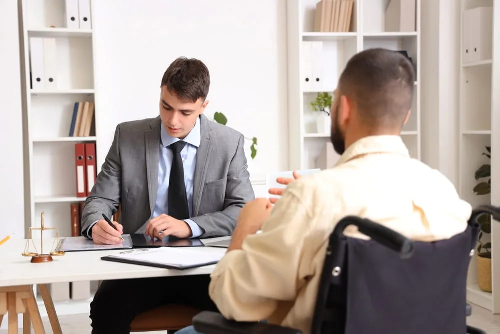 Texas injury attorney meeting with a catastrophically injured client to discuss a claim